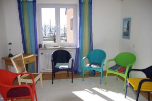 A welcoming circle of colorful chairs in an office