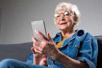 Woman seated with smartphone